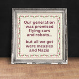 Our Generation was promised flying cars + robots but all we got were measles & Nazis Cross Stitch | Snarky Boomer Millennial Satire X-Stitch